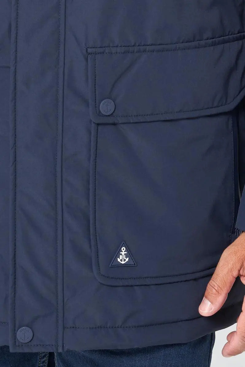 Batela Hombre. Chubasquero o impermeable con costuras selladas en poliester. Azul