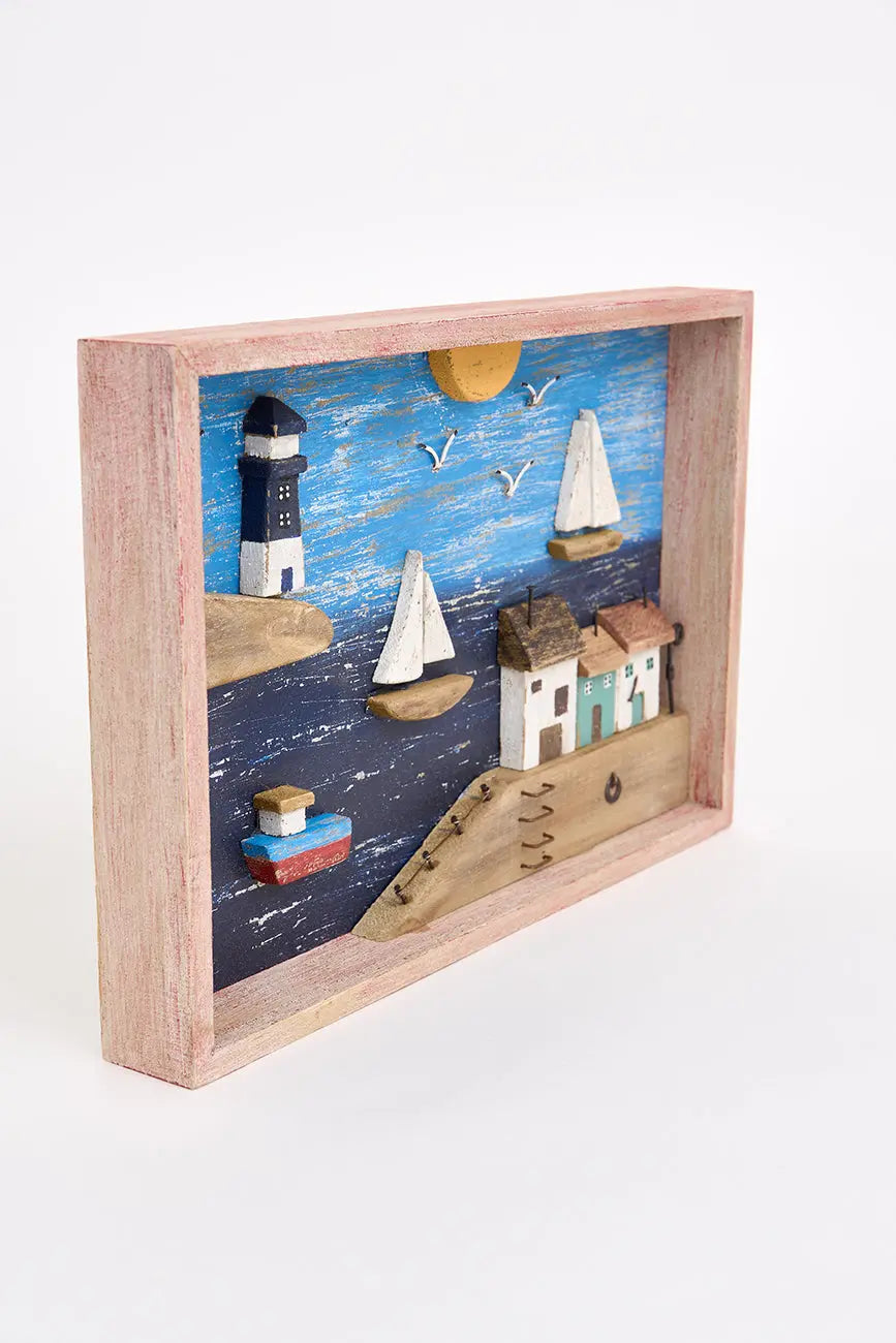 Cuadro de paisaje costero en madera envejecida