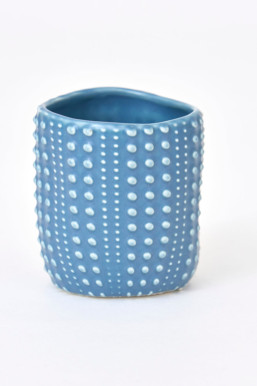 Ceramic mug with sea urchin texture