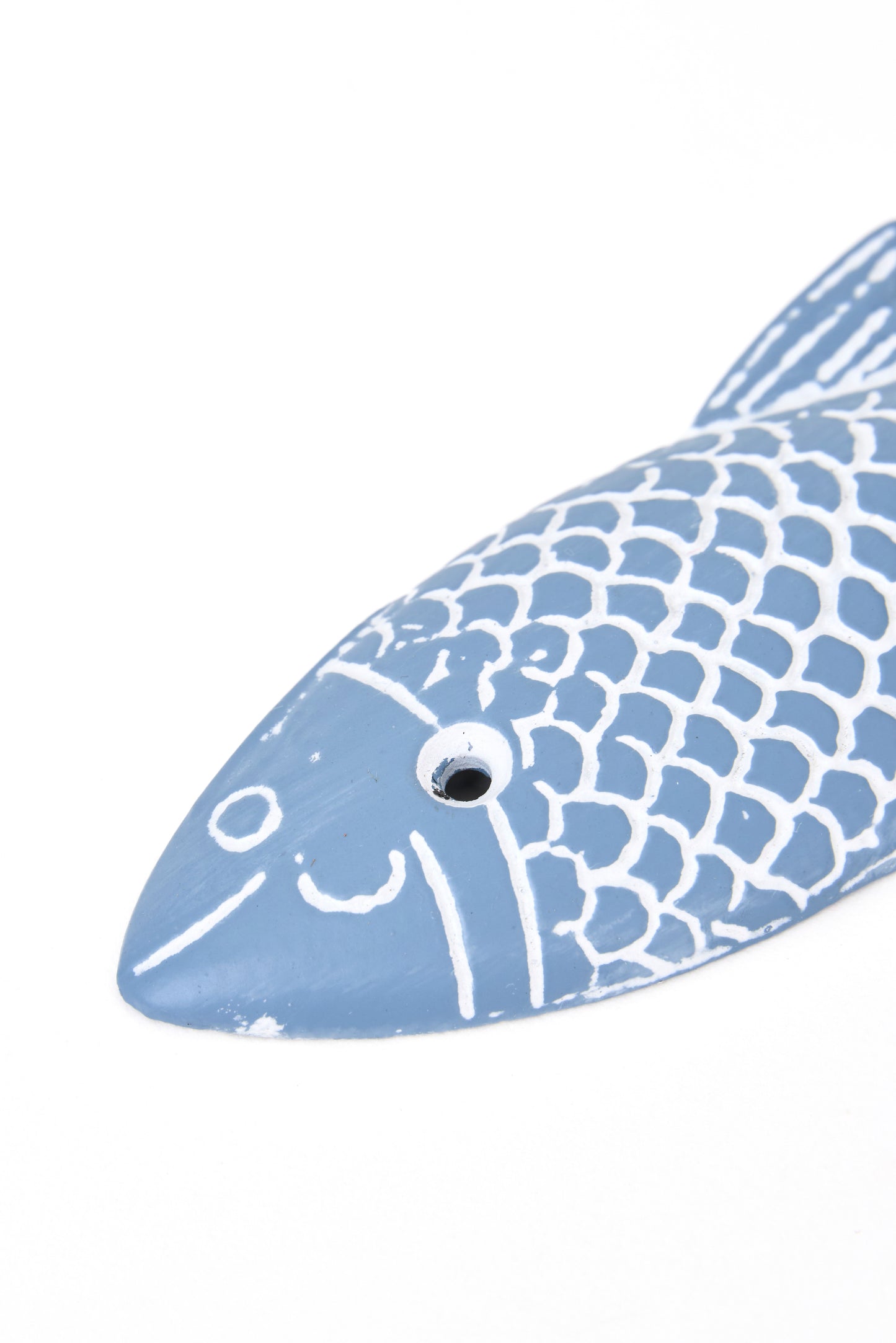 Arrain-forma duen metalezko esekitokia