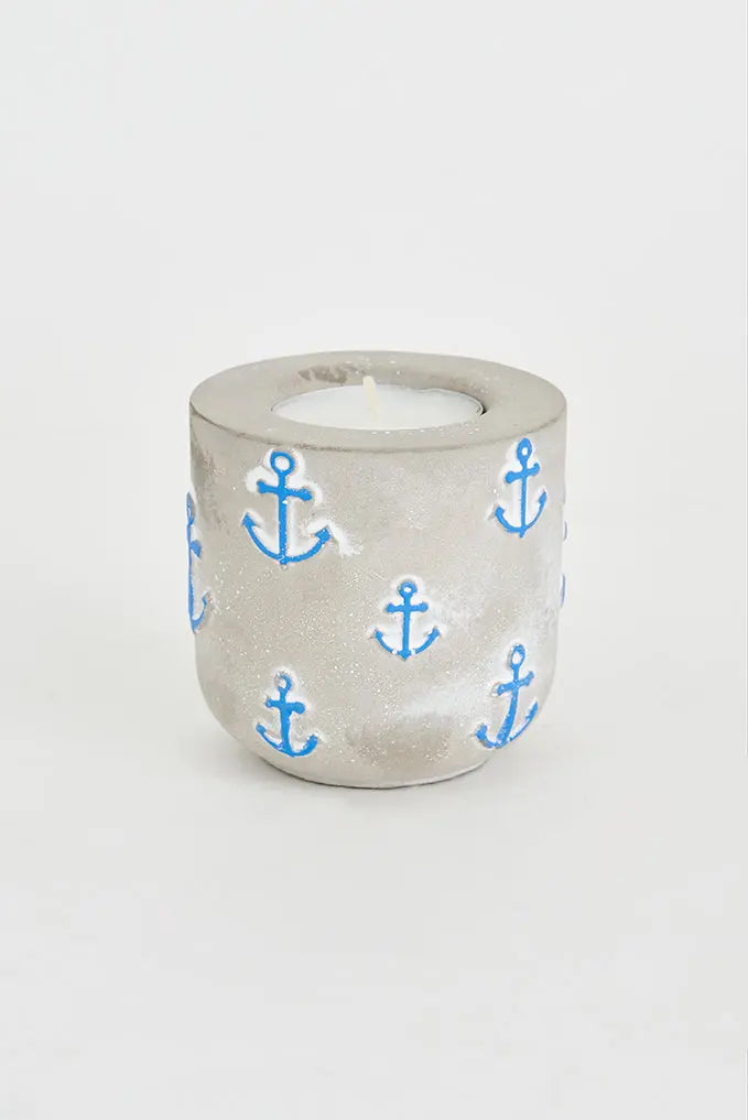 Portavelas de cemento con anclas azules