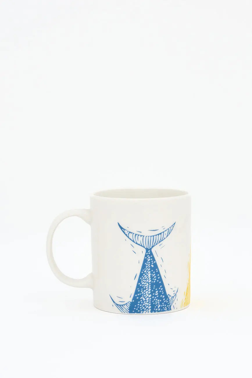 Taza en cerámica con colas de peces