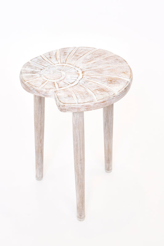 Nautilus stool made of carved wood