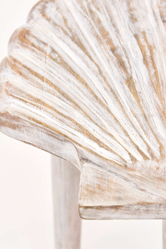 Carved wooden shell stool