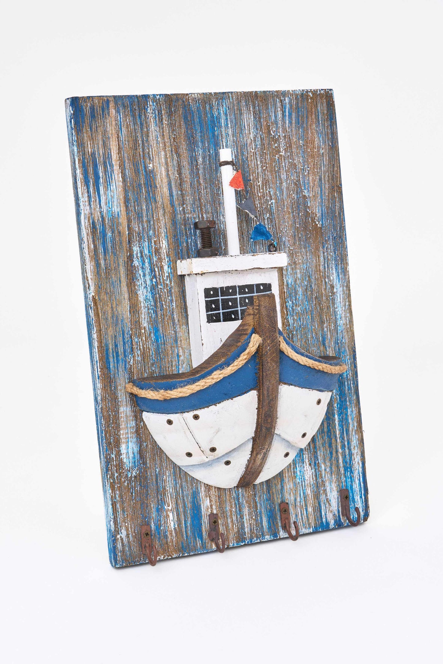 Wooden coat rack with fishing boat