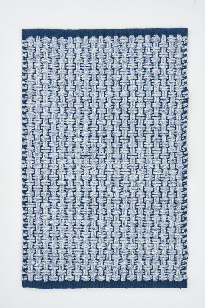 Alfombra de algodón tejido azul