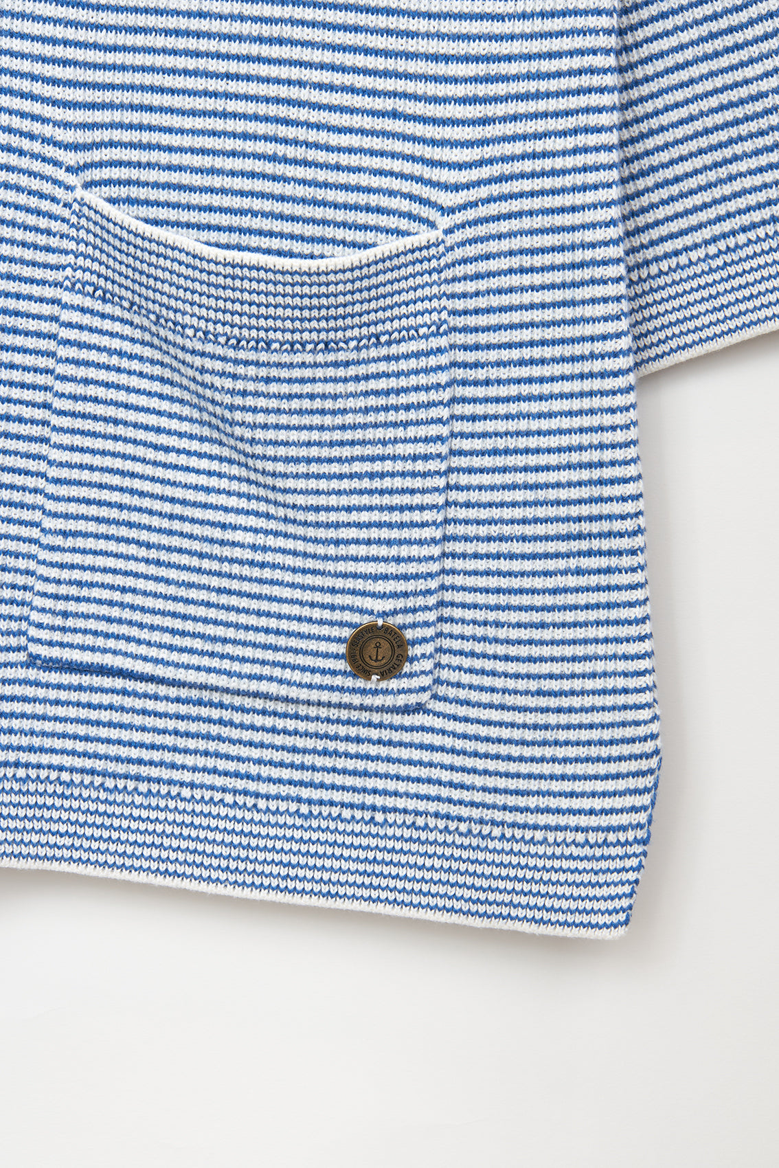 Jersey de punto a rayas y bolsillos