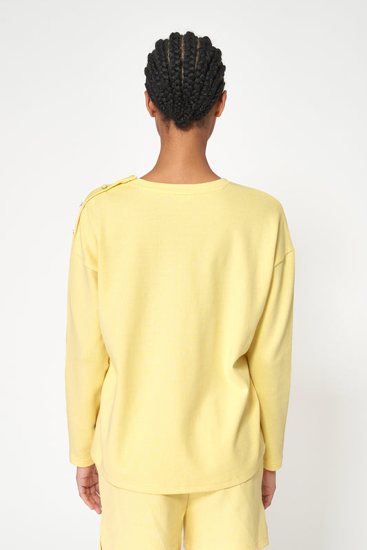 Camiseta algodón acanalado y botones en los hombros