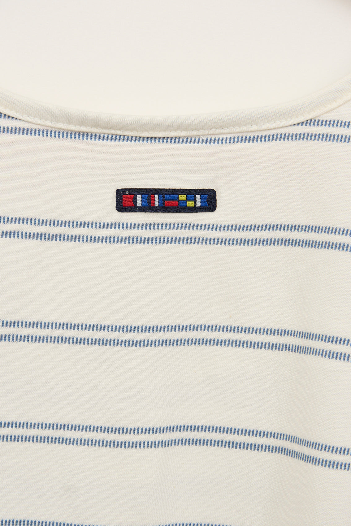Sleeveless T-shirt with 3D stripe buttoning on the chest
