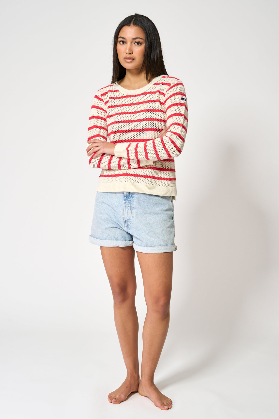 Openwork knit sweater with striped print
