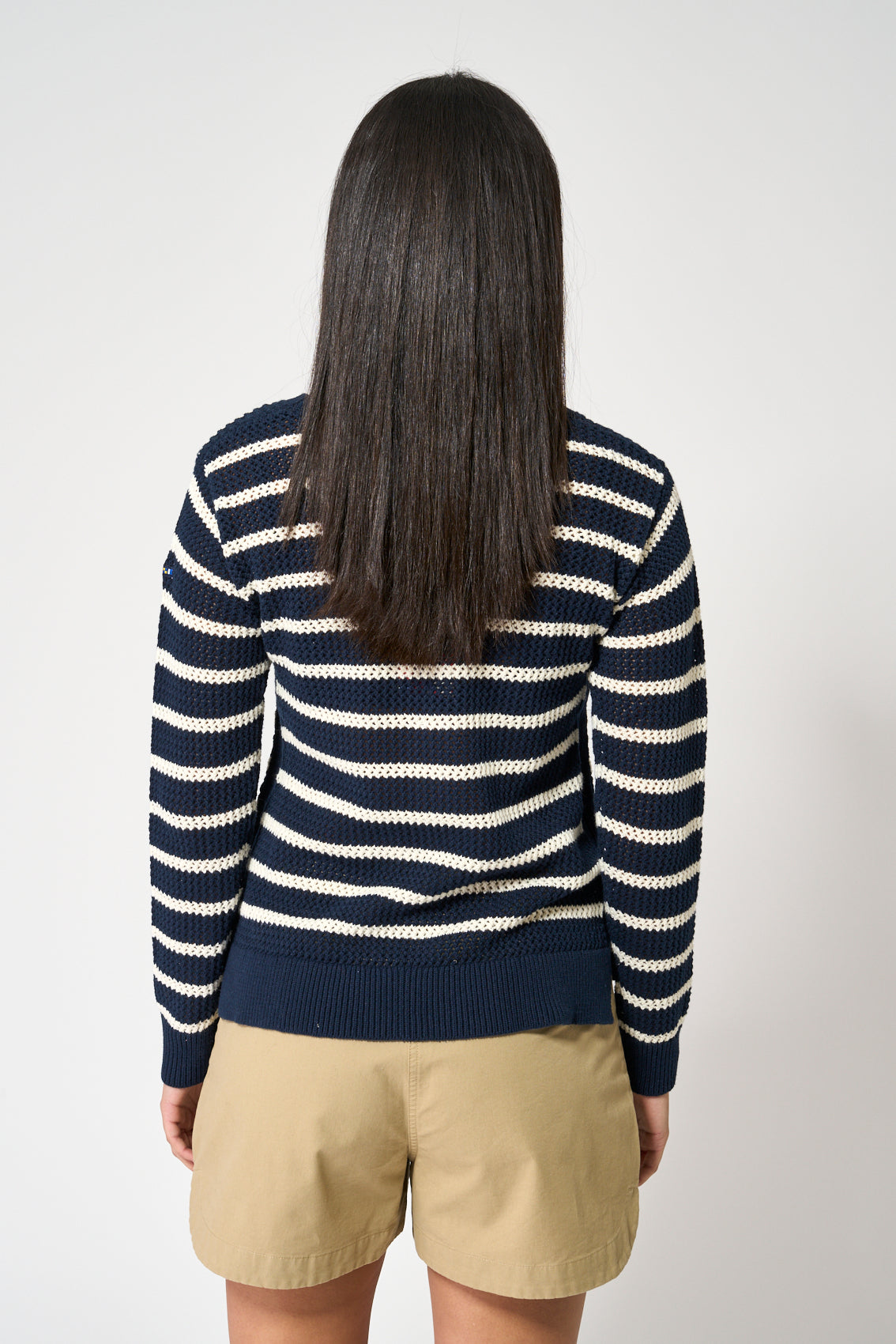Openwork knit sweater with striped print