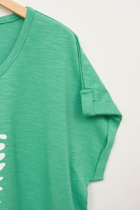 Camiseta manga corta estampado hojas