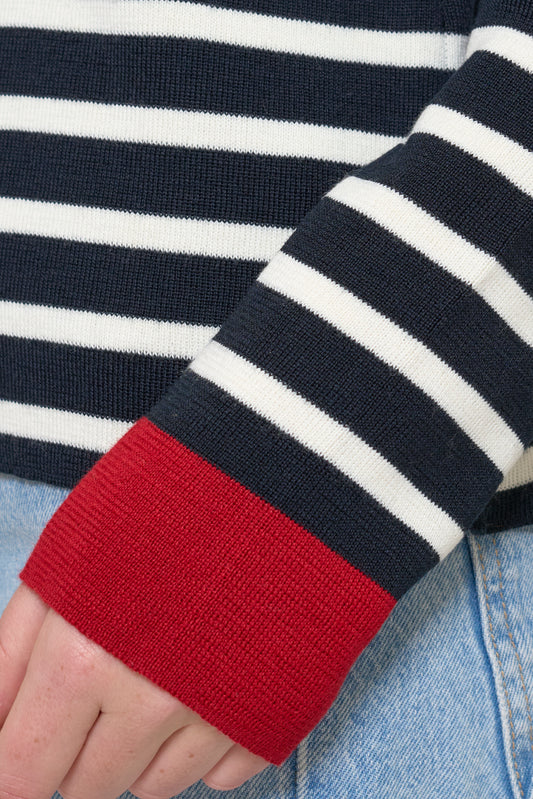 Striped knit pullover with contrasting cuffs
