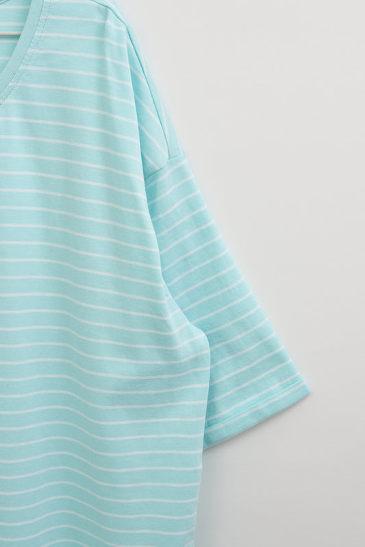 Camiseta a rayas con botones en la espalda