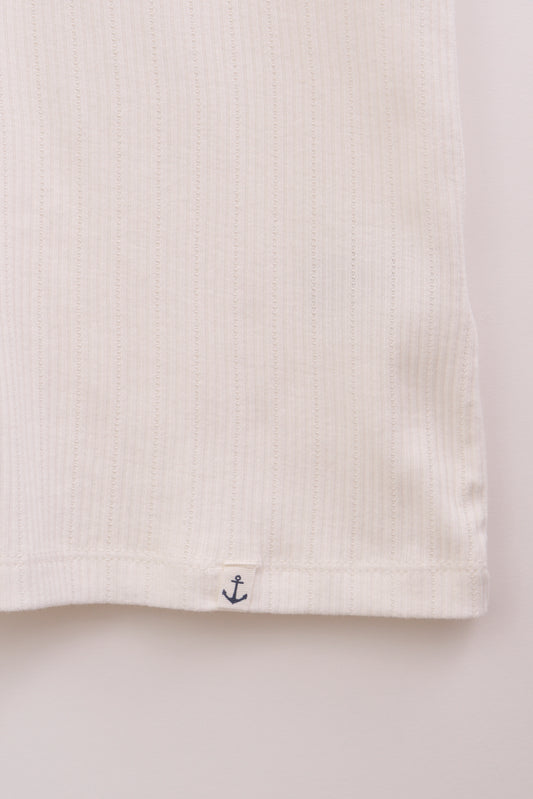 Top sin mangas en algodón pointelle