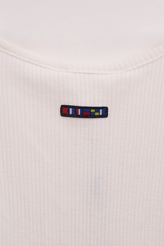 Top sin mangas en algodón pointelle