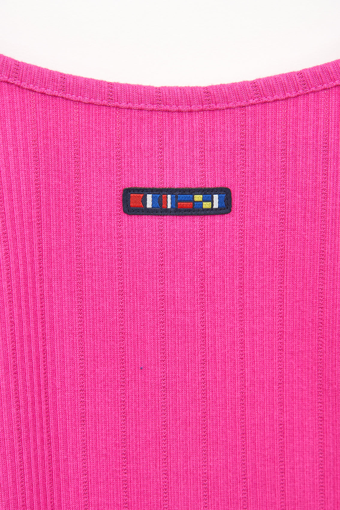 Top sin mangas en algodón pointelle