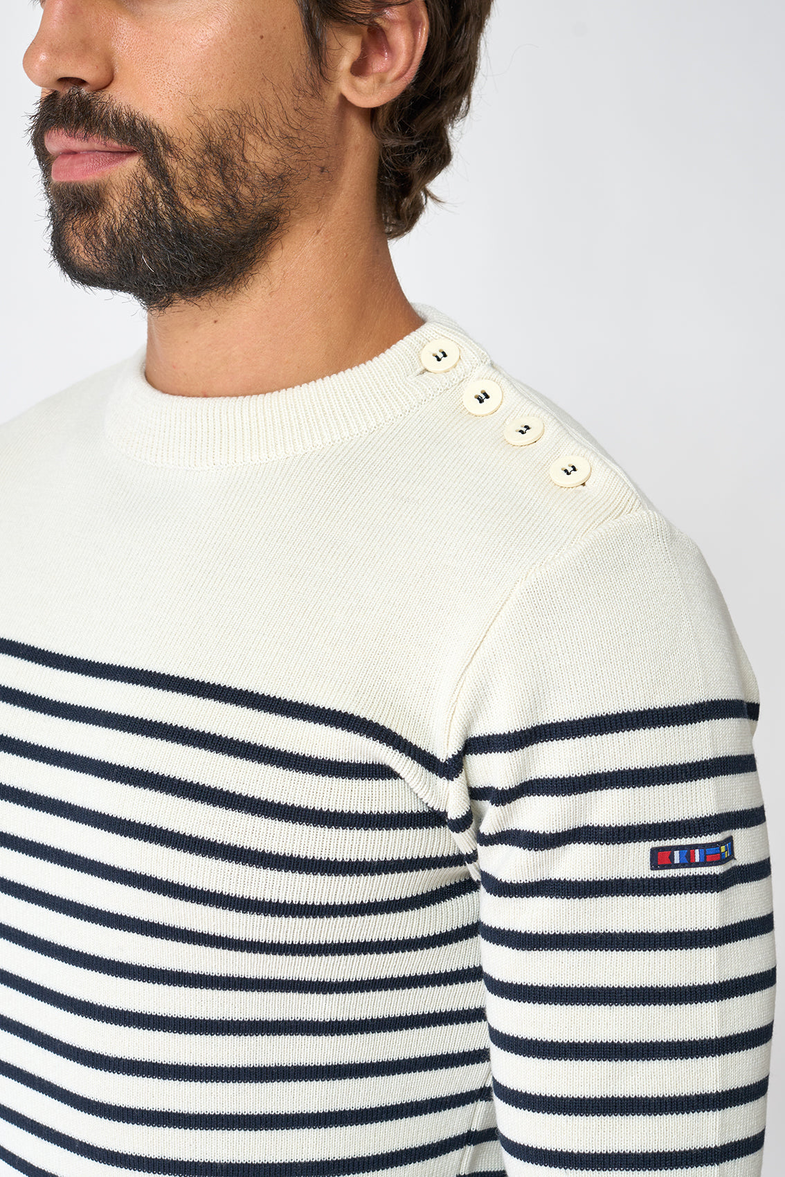 Breton wool sweater with crew neck and shoulder buttons