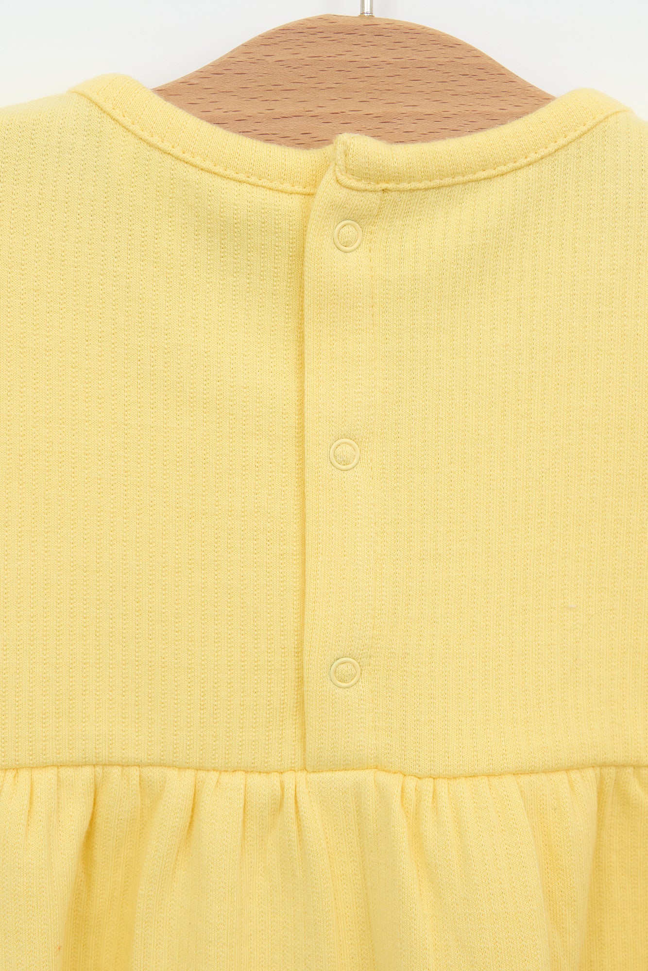 Robe bébé en coton côtelé à volants