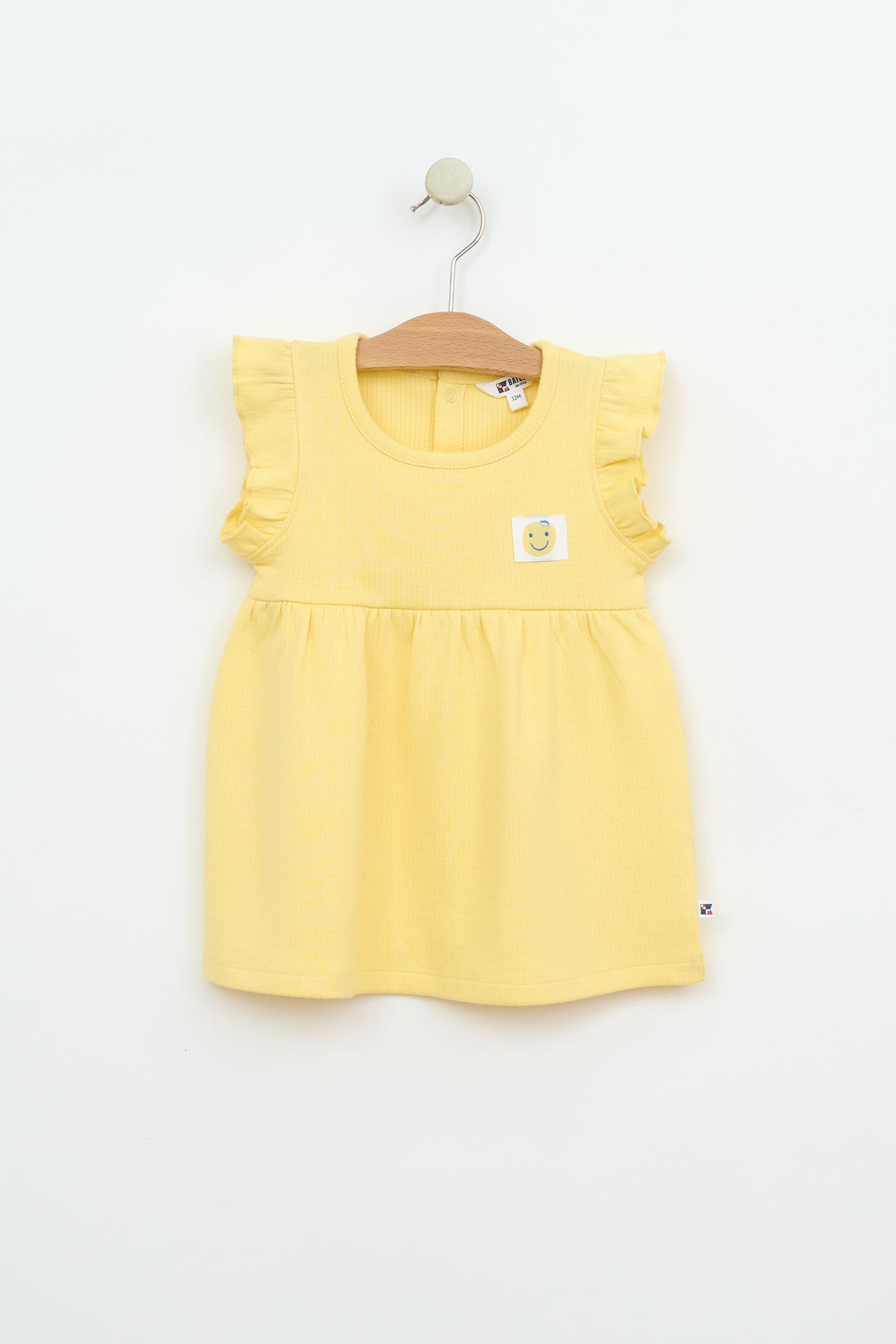 Robe bébé en coton côtelé à volants