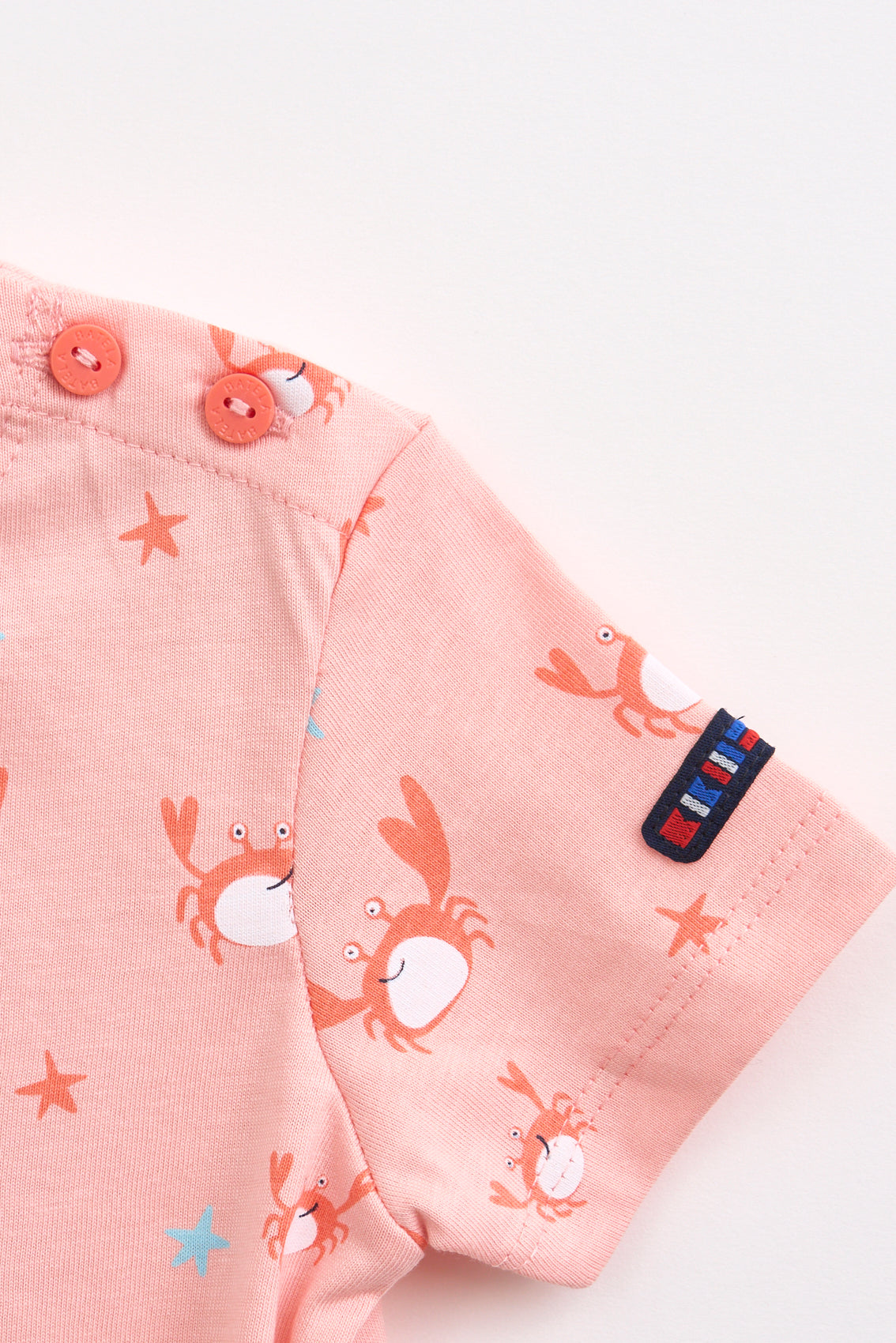 T-shirt à manches courtes avec imprimé de soleils ou melons