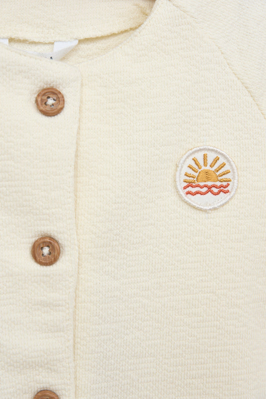 Baby jacket with sun patch