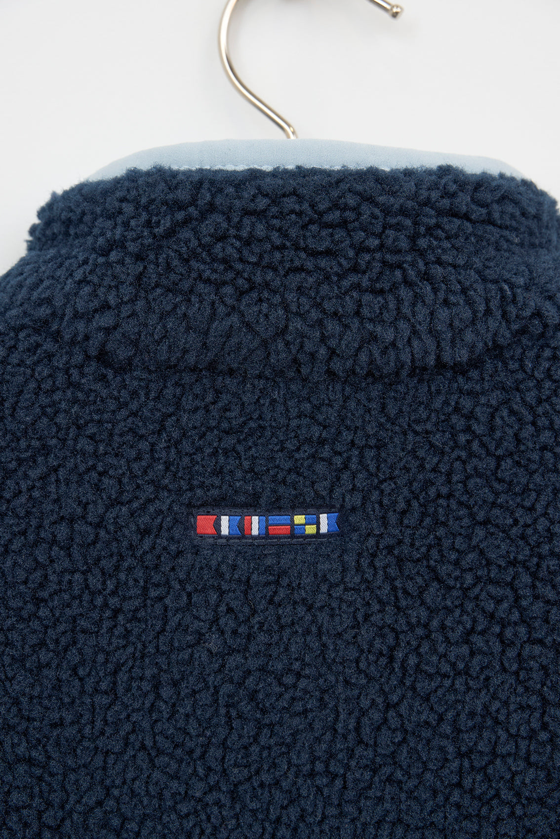 Veste effet mouton avec détails contrastés