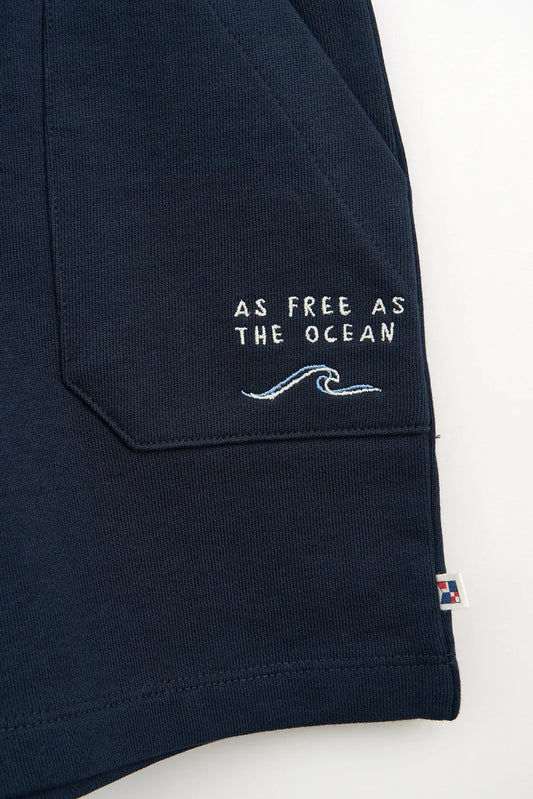 Cotton Bermuda shorts with embroidered 'As free as the ocean' detail