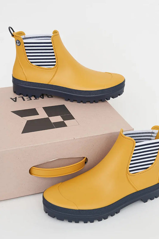 Women's waterproof rain boots or wellies yellow