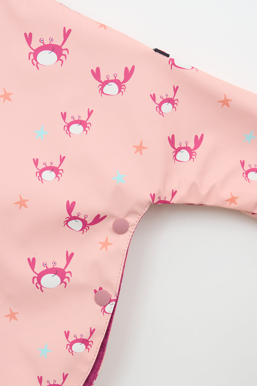 Chubasquero bebé tipo capa estampado forro interior de algodón