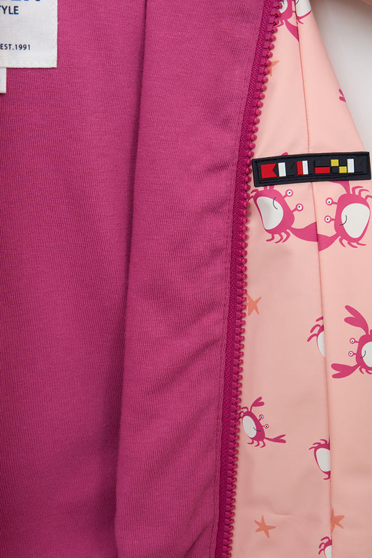 Printed cape-style baby raincoat with cotton lining