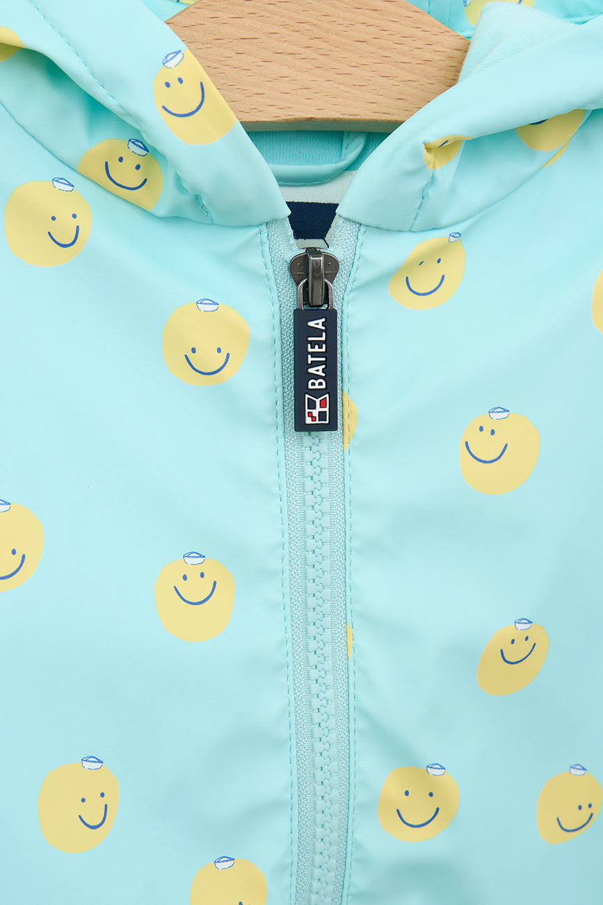 Chubasquero bebé tipo capa estampado forro interior de algodón