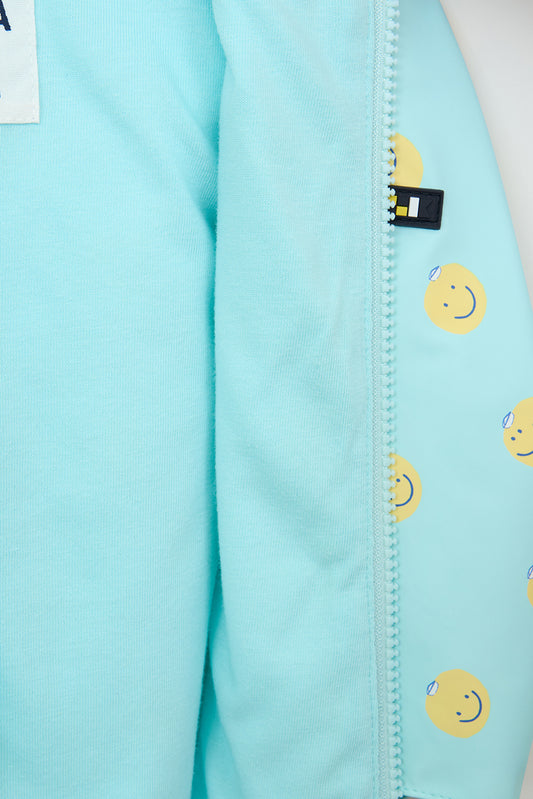 Printed cape-style baby raincoat with cotton lining