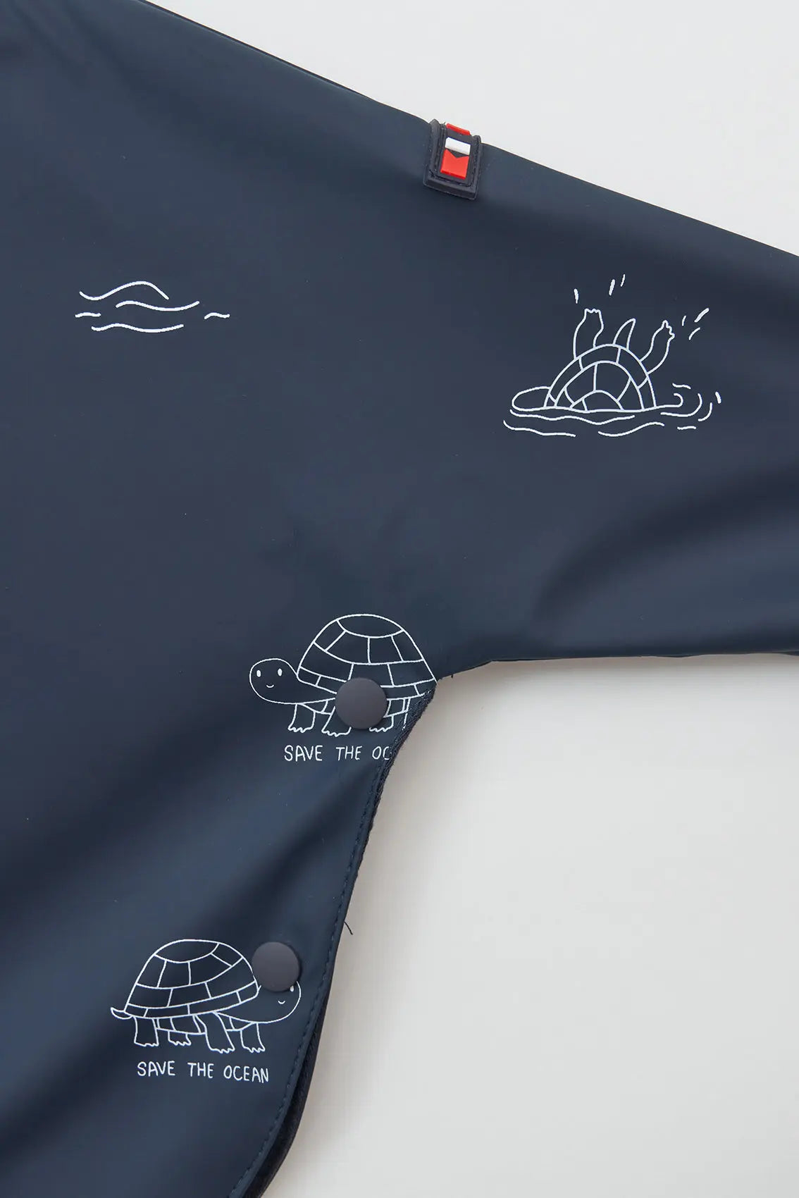 Chubasquero bebé tipo capa estampado forro interior de algodón