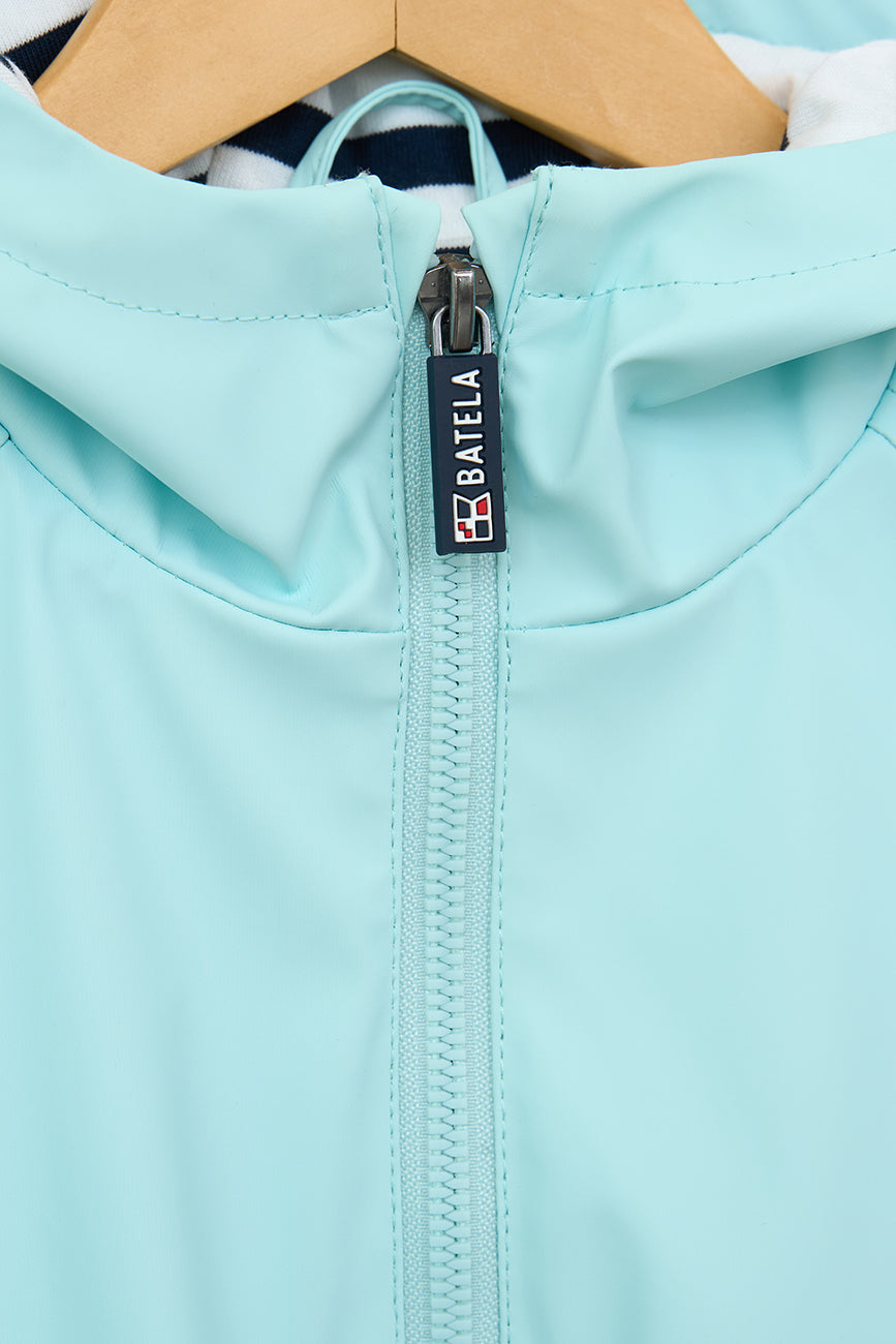 Haurrentzako marinel estiloko zira; barruko forrua kotoizkoa eta marraduna da