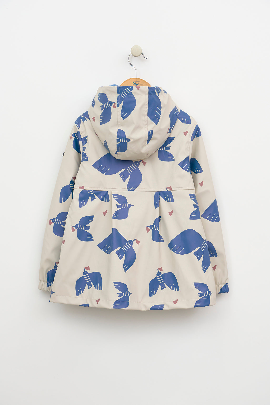 Kids’ polyurethane patterned raincoat with furry lining