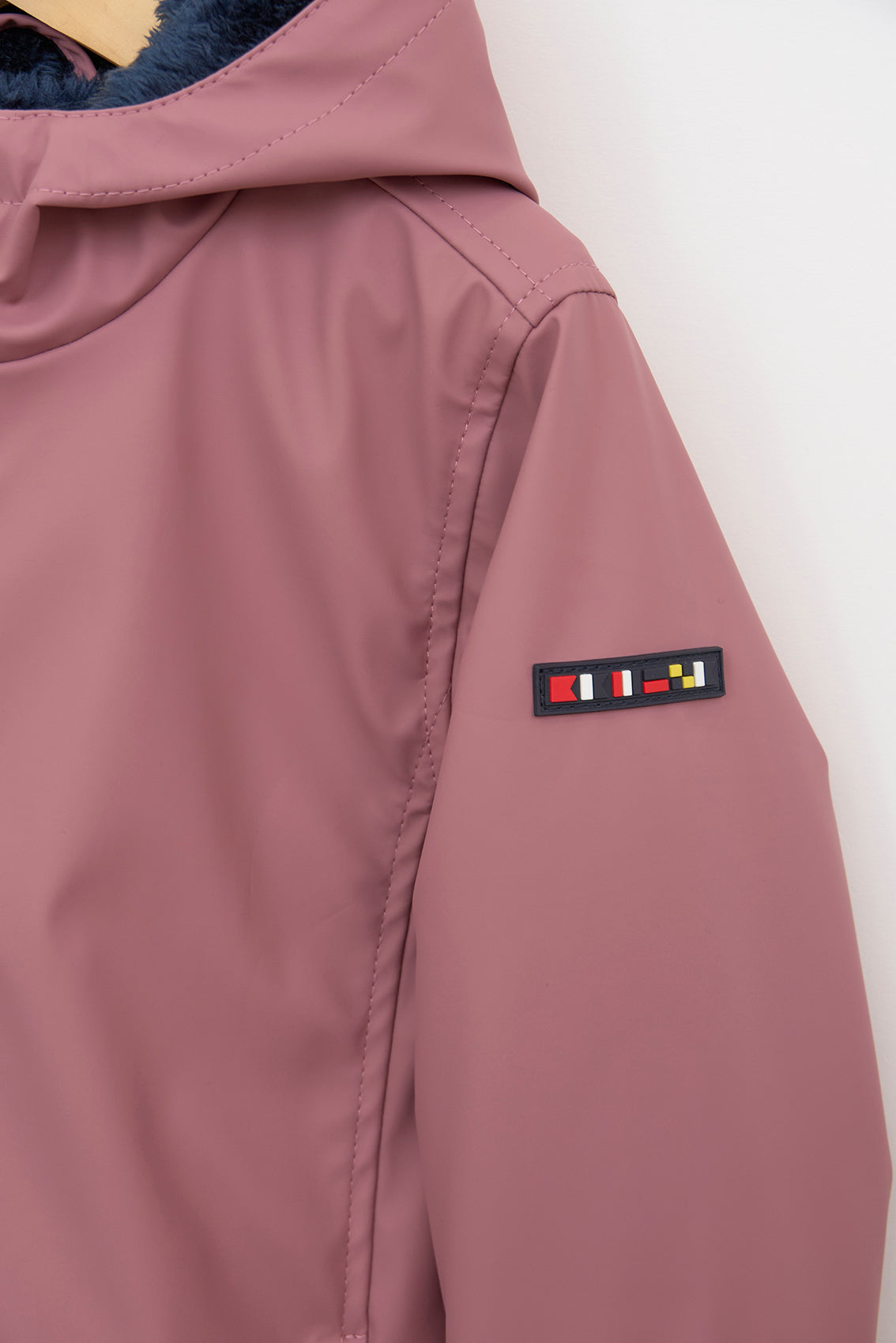 Kids’ polyurethane raincoat with furry lining