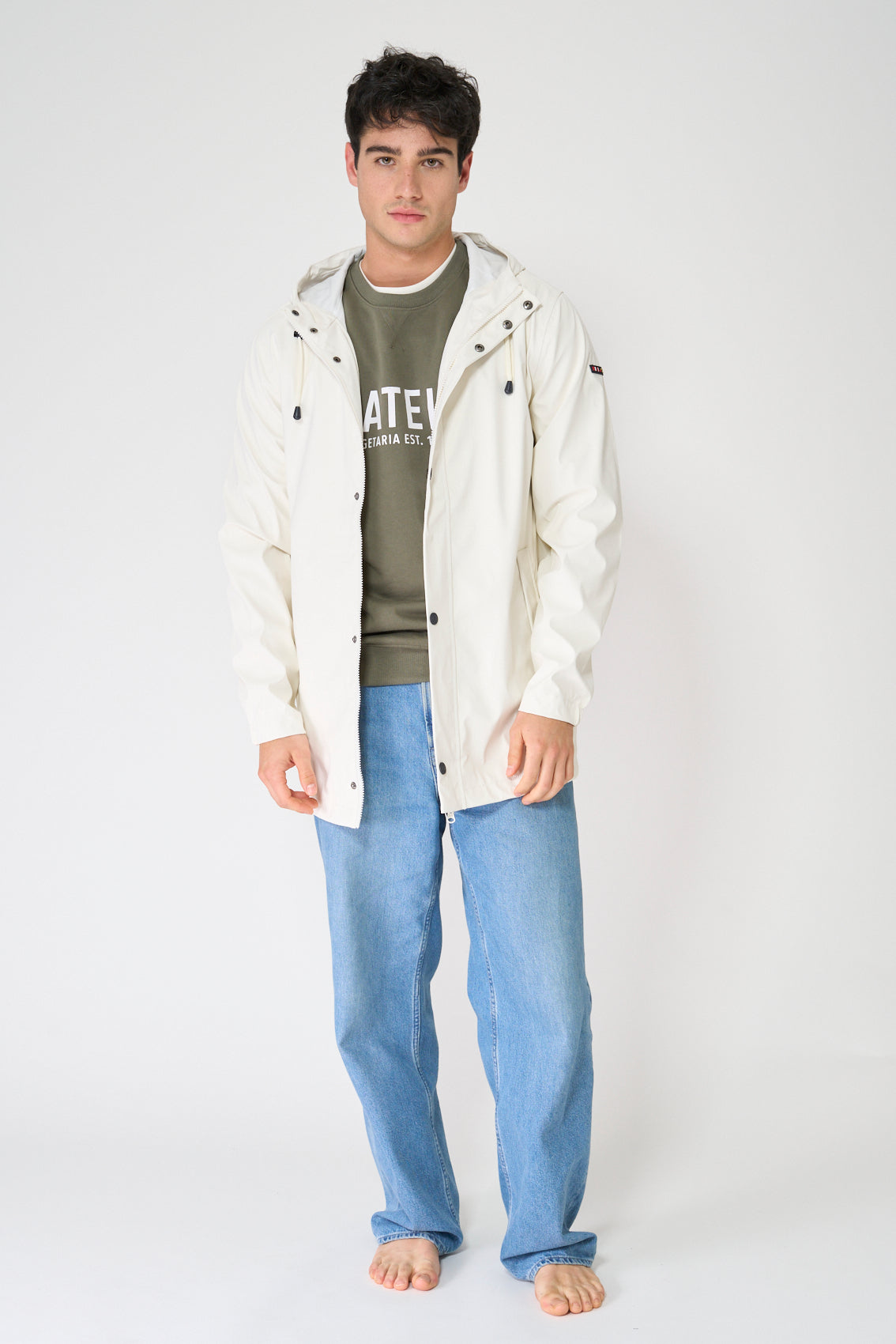 Lightweight loose-fitting 100% waterproof UNISEX rain jacket