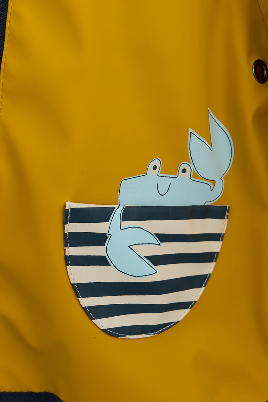 Imperméable bébé à poches crabe et doublure coton rayée