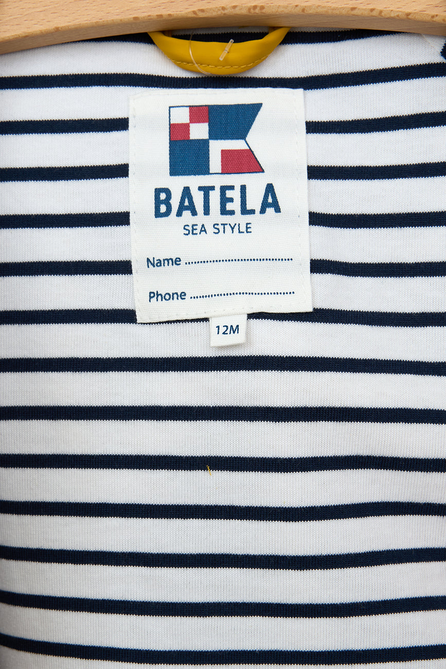 Imperméable bébé à poches crabe et doublure coton rayée