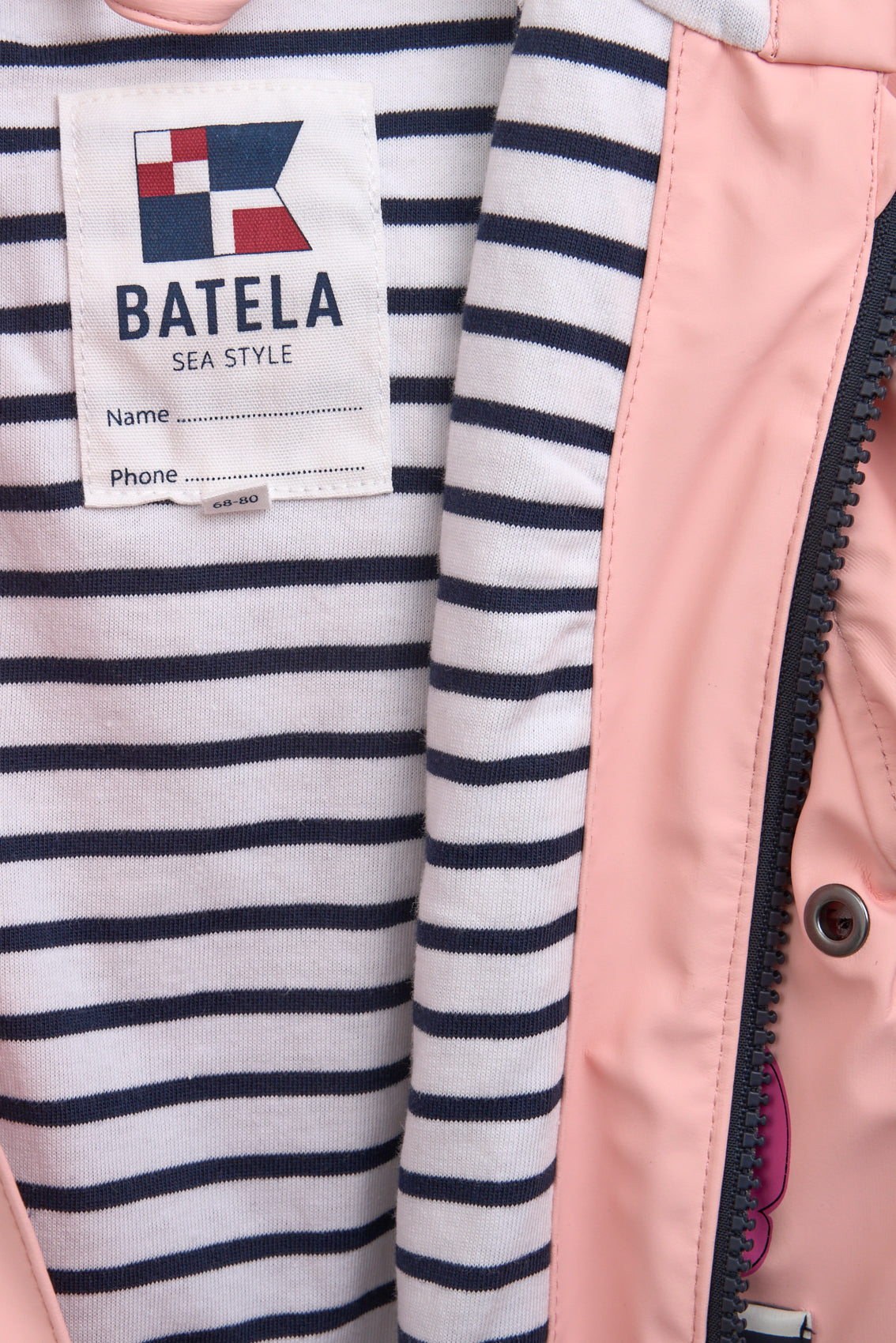 Imperméable bébé à poches crabe et doublure coton rayée