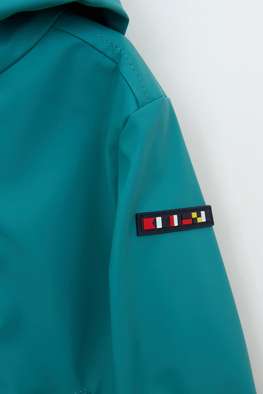 Chubasquero bebé marinero con forro a rayas