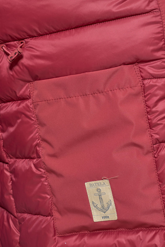 Waterproof coat with waist detail