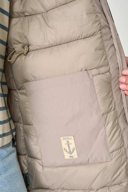 Waterproof coat with waist detail