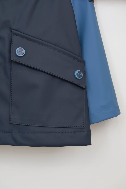 Two-tone baby raincoat with fleece lining