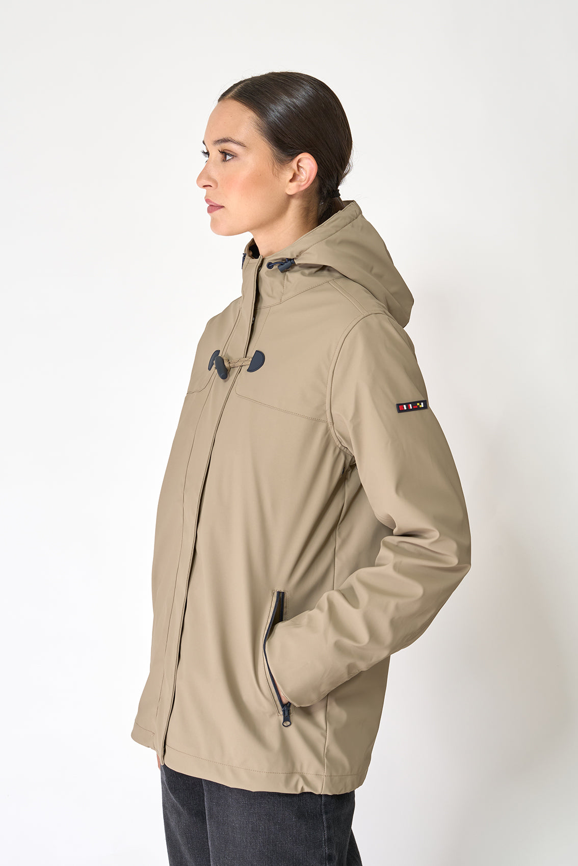 Short waterproof jacket with duffle-style detailing