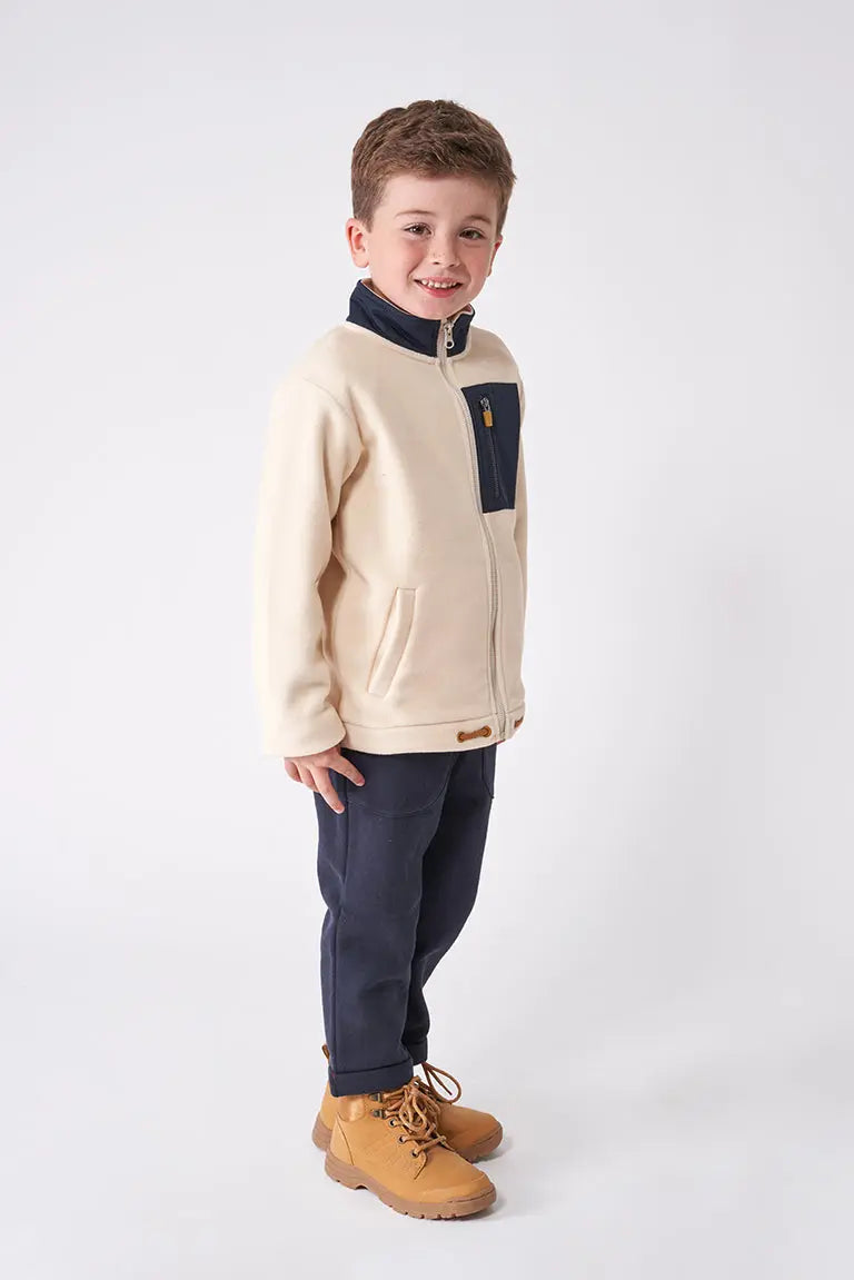 Polar jacket with patch and front pocket.