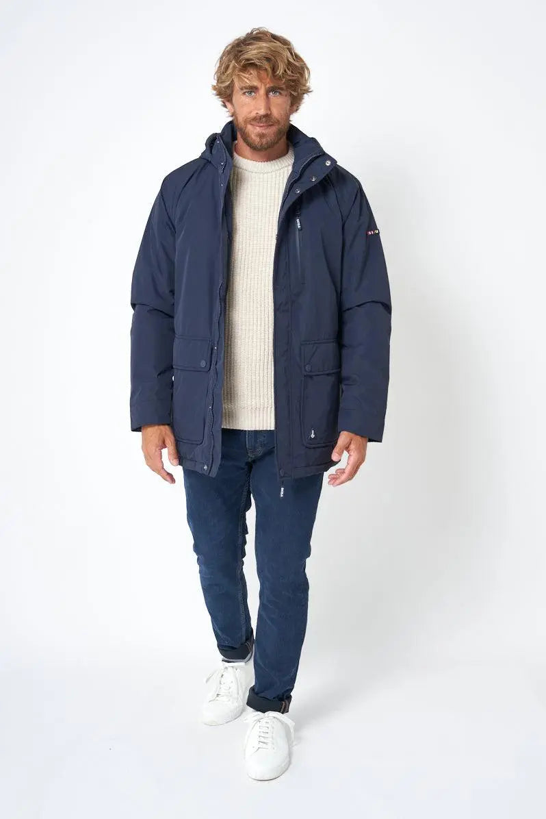 Batela Hombre. Chubasquero o impermeable con costuras selladas en poliester. Azul