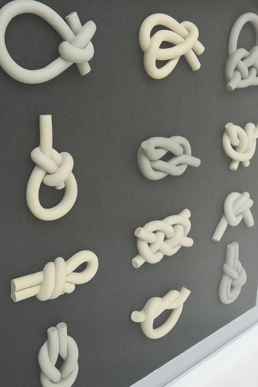 Marinel-korapiloen koadro karratua