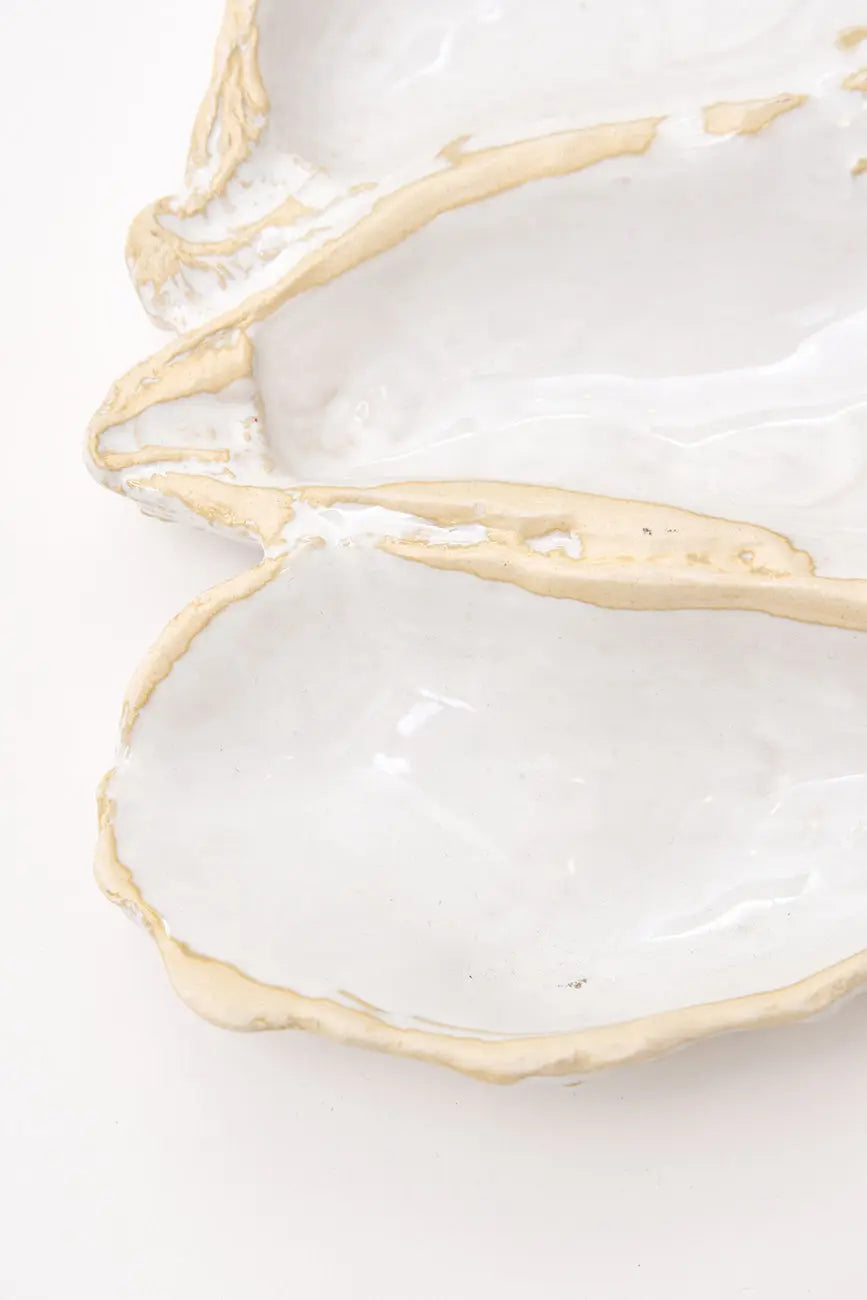 Oyster-shaped ceramic bowl